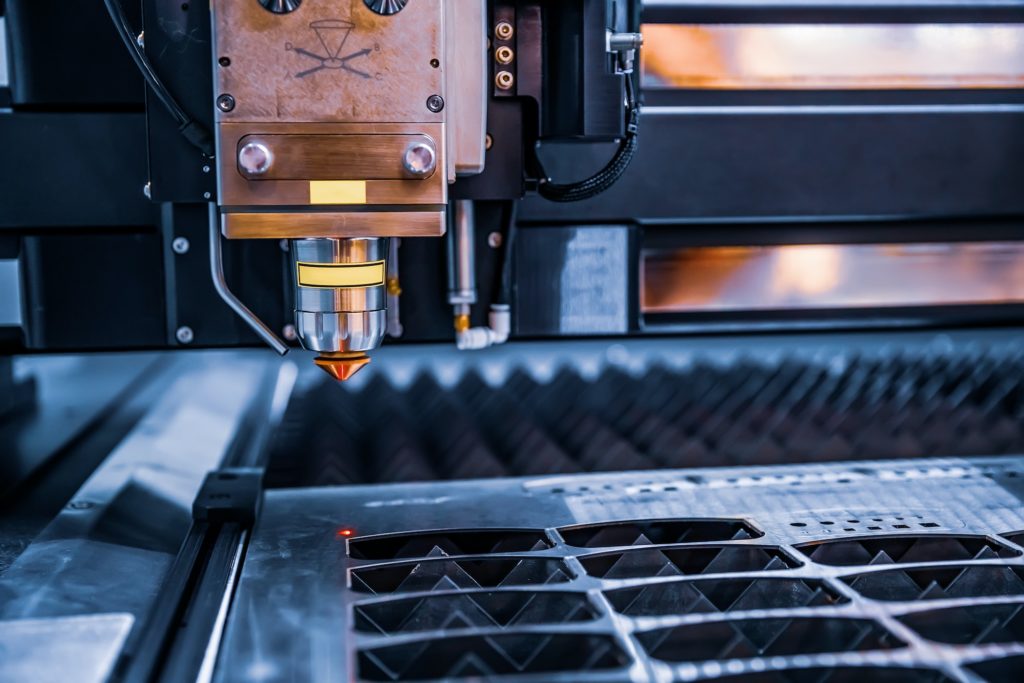 CNC Laser cutting of metal, modern industrial technology.
